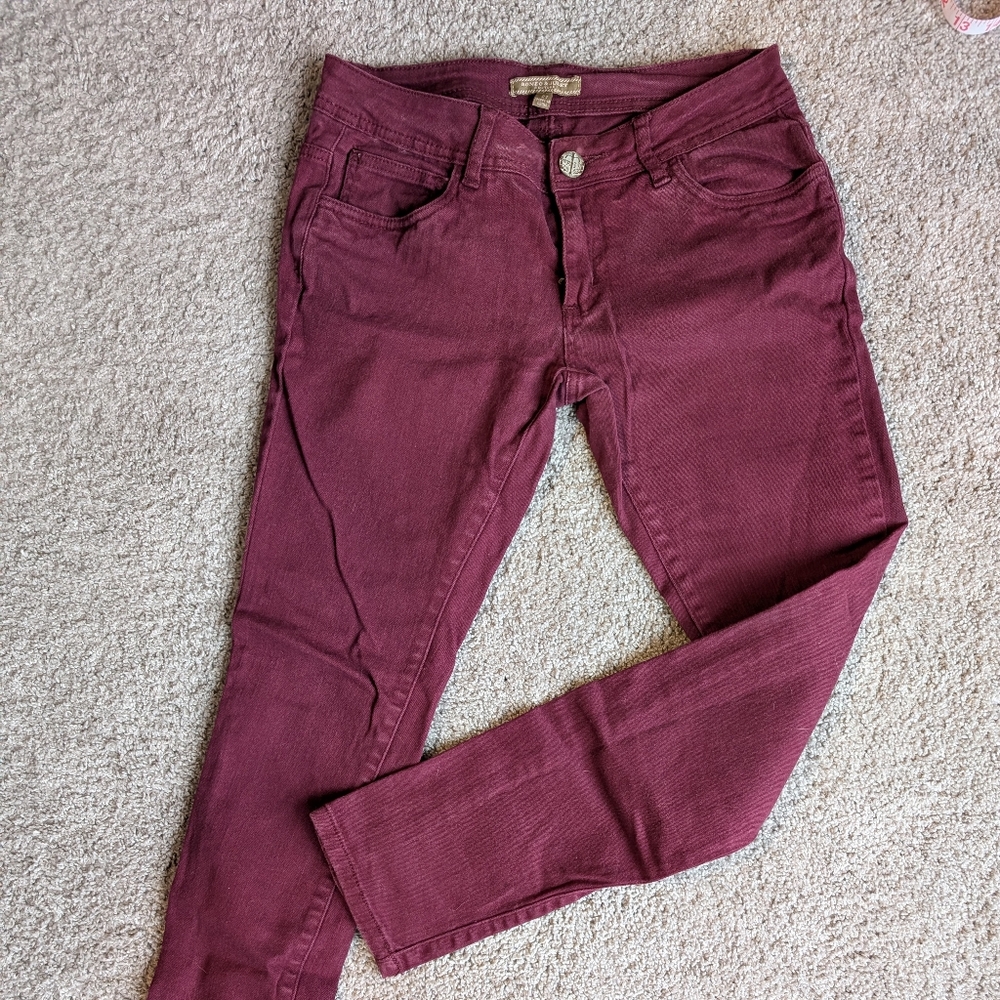 Cranberry colored skinny jeans by Romeo & Juliet couture